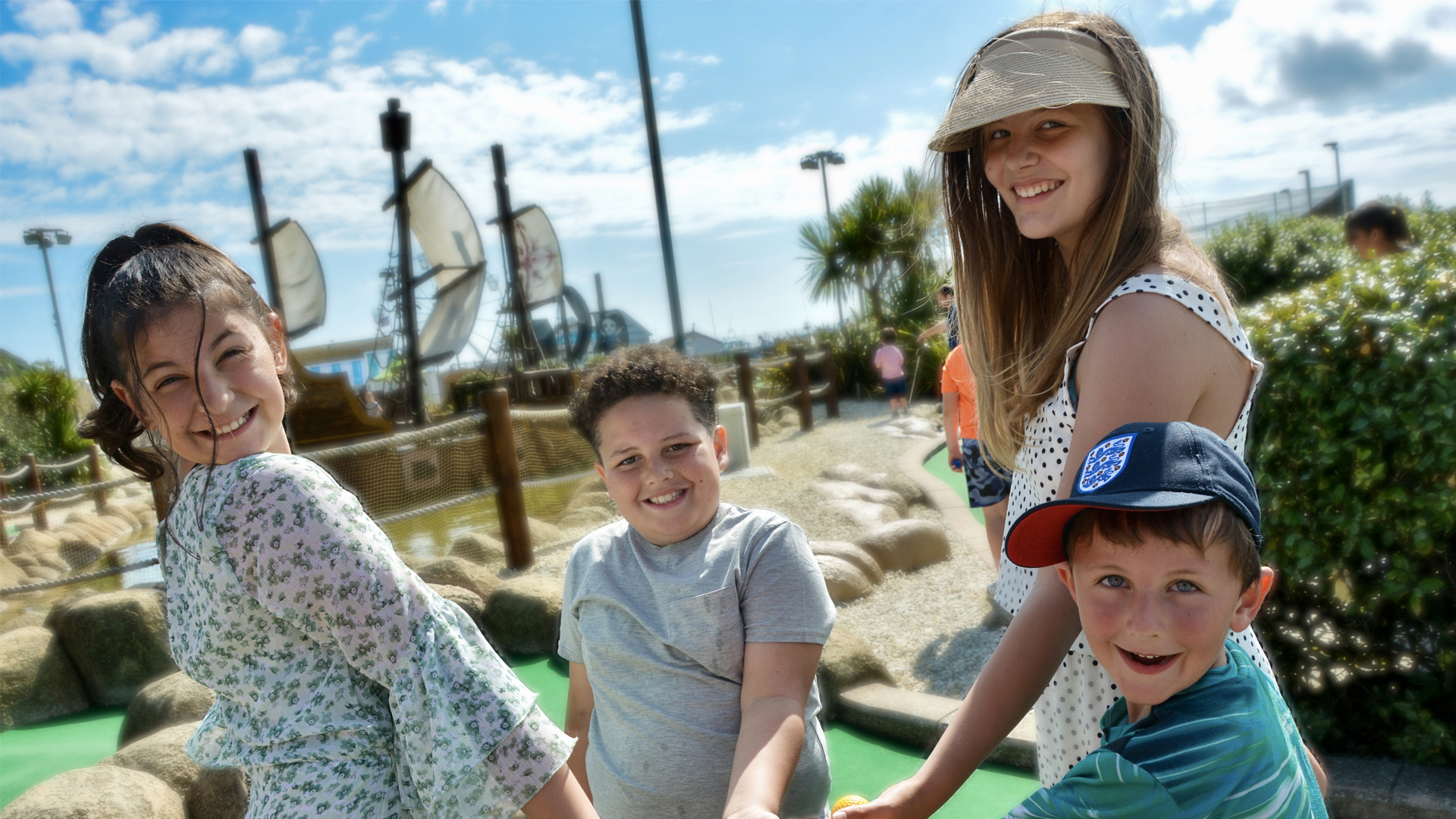family enjoying the pirate golf at hastings adventure golf