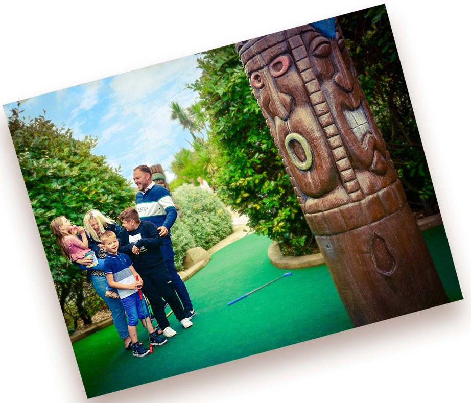 family playing the adventure course at hastings adventure golf